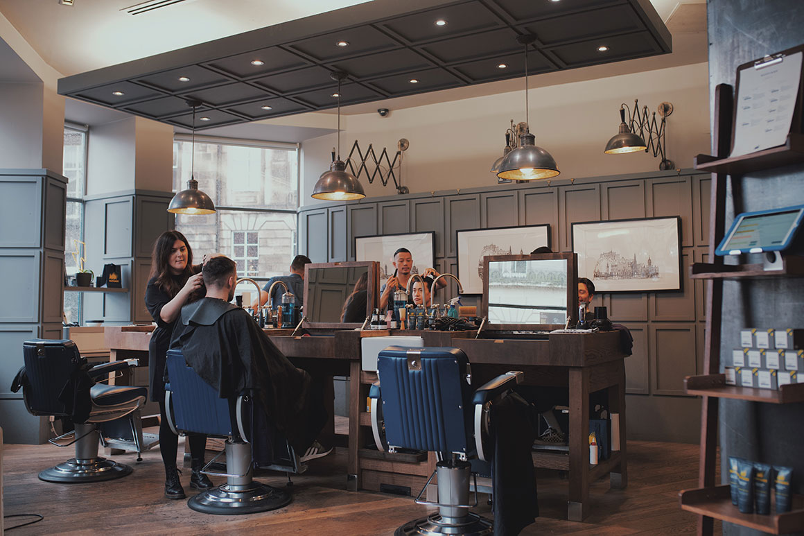 Image of man getting his hair cut